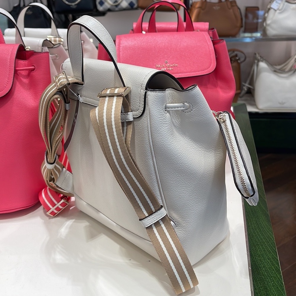 Kate Spade Rosie Medium Flap Backpack 
K8714 pebbled leather Parchment rosie
NWT - Picture 10 of 16